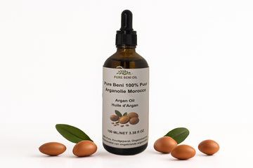 alt="PURE BENI Organic Cold Pressed Argan Oil bottle for anti-aging and hair repair"