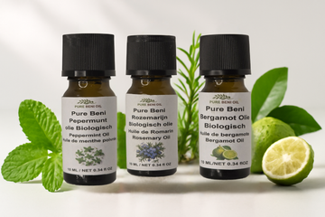 alt=PURE BENI organic essential oil trio with peppermint, rosemary and bergamot oils in 10ml amber glass bottles