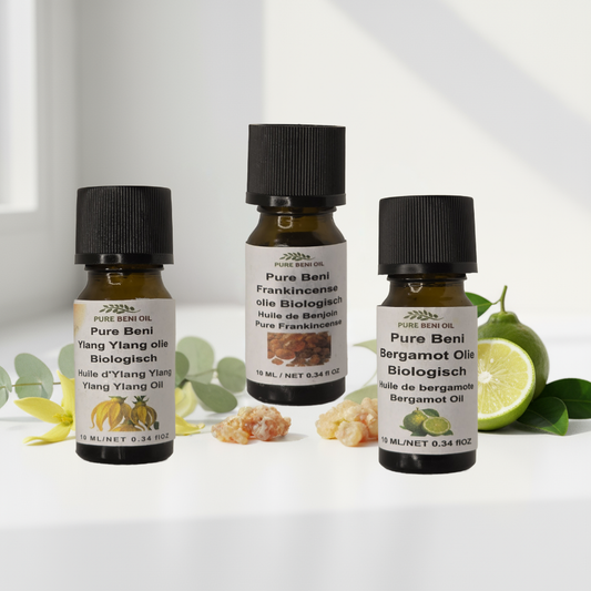alt="PURE BENI Organic Luxury Trio essential oils set with Frankincense and Ylang Ylang for mindfulness and elegance"