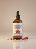 alt=PURE BENI organic rosehip seed oil in amber glass bottle for natural skincare and wellness rituals