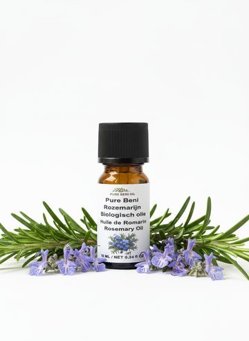 alt="PURE BENI bottle of Organic Rosemary Essential Oil for hair growth and scalp massage"